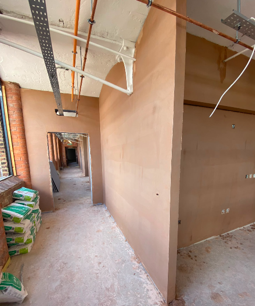 Plastering works in progress on levels 1 to 4 at Brunswick Mill