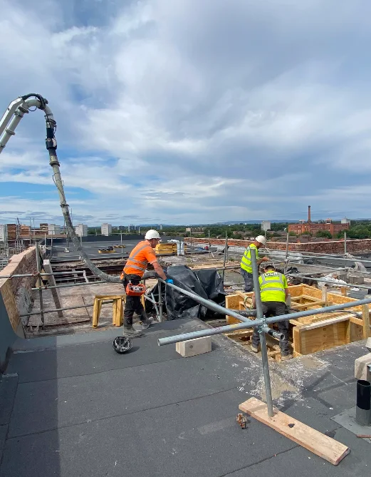 Main roof automatic opening vents being concreted at Brunswick Mill