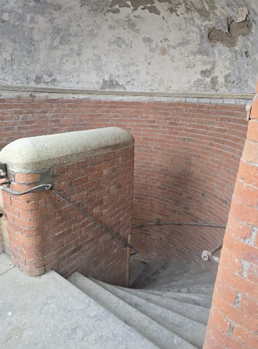 Brickwork cleaning to one of the two main central curved staircases at Brunswick Mill